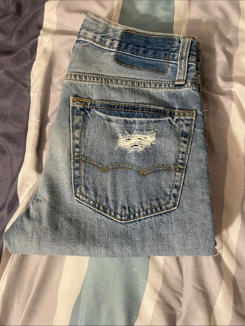 American Eagle Outfitters Slim Distressed Light Blue Jeans